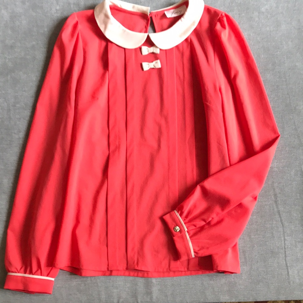 Orange blouse with key hole closure